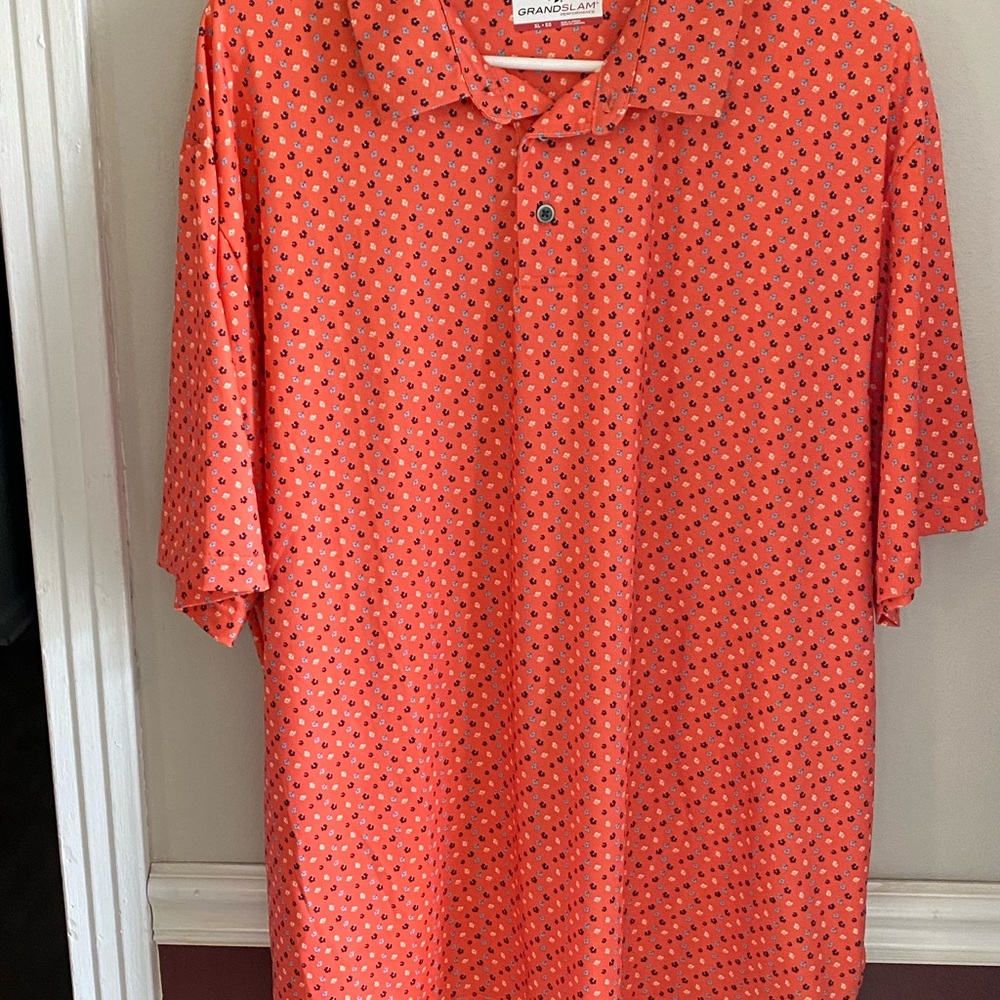 Grand Slam Salmon colored Polo Shirt Vibrant Style